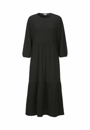 Abito midi nero con piccoli pois bianchi, scollatura rotonda, maniche a tre quarti a sbuffo e gonna arricciata a balze.
