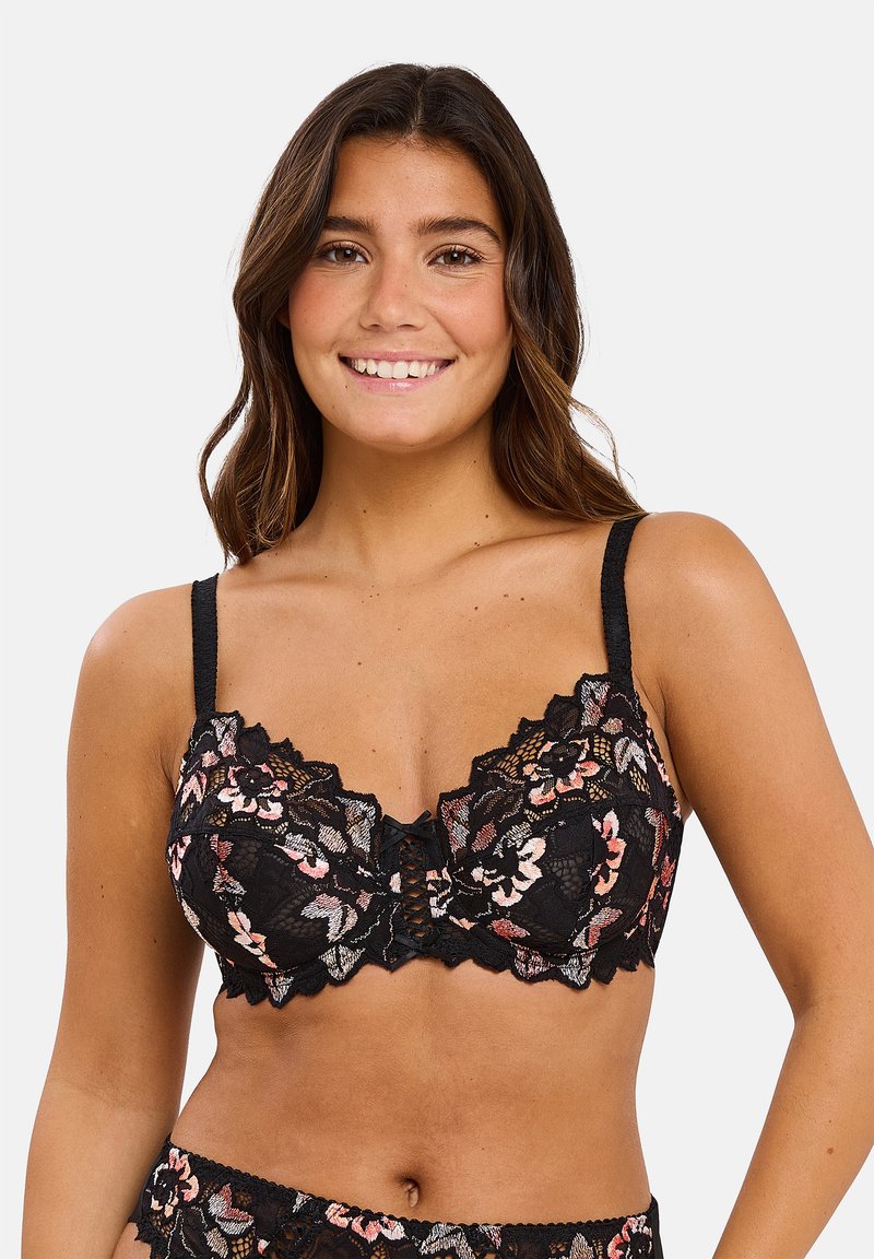Soutien-gorge en dentelle noire avec broderies florales rose et crème, avec des bords festonnés et des bretelles ajustables, conçu avec une fermeture à crochets à l'avant.