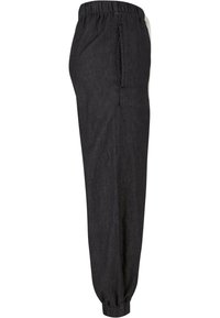 Black, lightweight jogger pants with an elastic waistband and cuffed ankles. Features side pockets and a smooth, textured fabric.