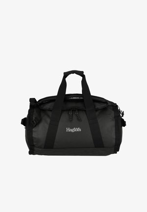 Schwarze Reisetasche aus strapazierfähigem Material, mit zwei Traggriffen, einem Frontreißverschluss und Logo. Strukturierte Oberfläche mit verstellbaren Riemen.