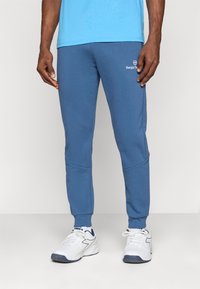 Sergio Tacchini - BOLD PANTS - Tracksuit bottoms - ensigne blue/white Thumbnail Image 1