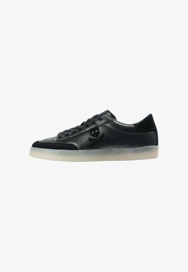 Black low-top sneaker with matte finish, lace-up design, skull and crossbones detail on side, and semi-translucent light-colored sole.