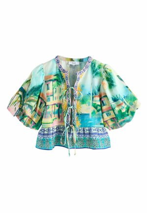 Blúzka s kvetinovým vzorom a zvonovými rukávmi. Má šnurovanie vpredu, žiarivé farby, tropické motívy a zložito vzorovaný lem. Ľahká látka.