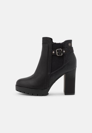 Bottines à talons hauts - black