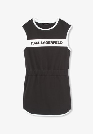 Robe noire sans manches avec un col blanc côtelé et une bande horizontale blanche portant le texte "KARL LAGERFELD" sur la poitrine. Taille élastique.