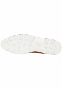 Semelle en caoutchouc avec une surface blanche texturée, présentant un motif de bande de roulement pour une meilleure adhérence et un bord supérieur brun là où elle rencontre la semelle.