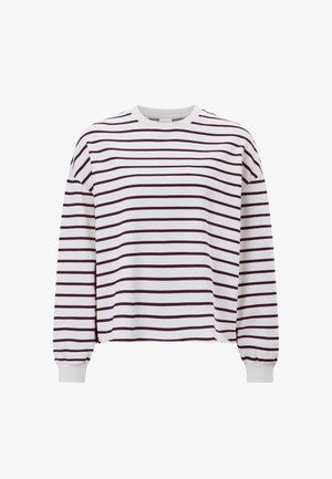 Bela majica z dolgimi rokavi z bordo rdečimi vodoravnimi črtami, okrogel izrez in nabranimi manšetami na rokavih. Mehka, bombažna mešanica.