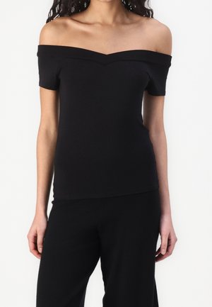 Zwarte off-shoulder top van rekbare stof met een aansluitende pasvorm. Heeft korte mouwen en een V-vormige halslijn. Soepele textuur.