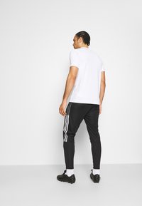 adidas Performance TIRO21 TRAININGS PANT - Trainingsbroek - black