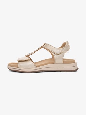 Beige sandaal met open teen, voorzien van twee verstelbare klittenbandriemen en een gevoerde zool, ontworpen voor comfort en casual gebruik.