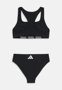 Maillot de bain deux pièces noir avec un haut à dos nageur et une bande texturée, ainsi qu'un bas classique. Accent du logo de la marque en blanc sur les deux pièces.