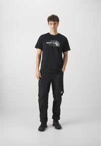 The North Face EASY TEE - Camiseta estampada - black
