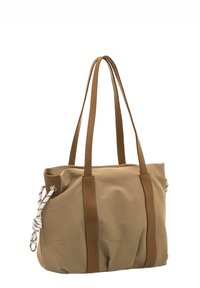 Bolso tote de tela beige con detalles de cuero marrón, correas largas y cordón de cuerda. Textura suave y gran capacidad para guardar objetos.