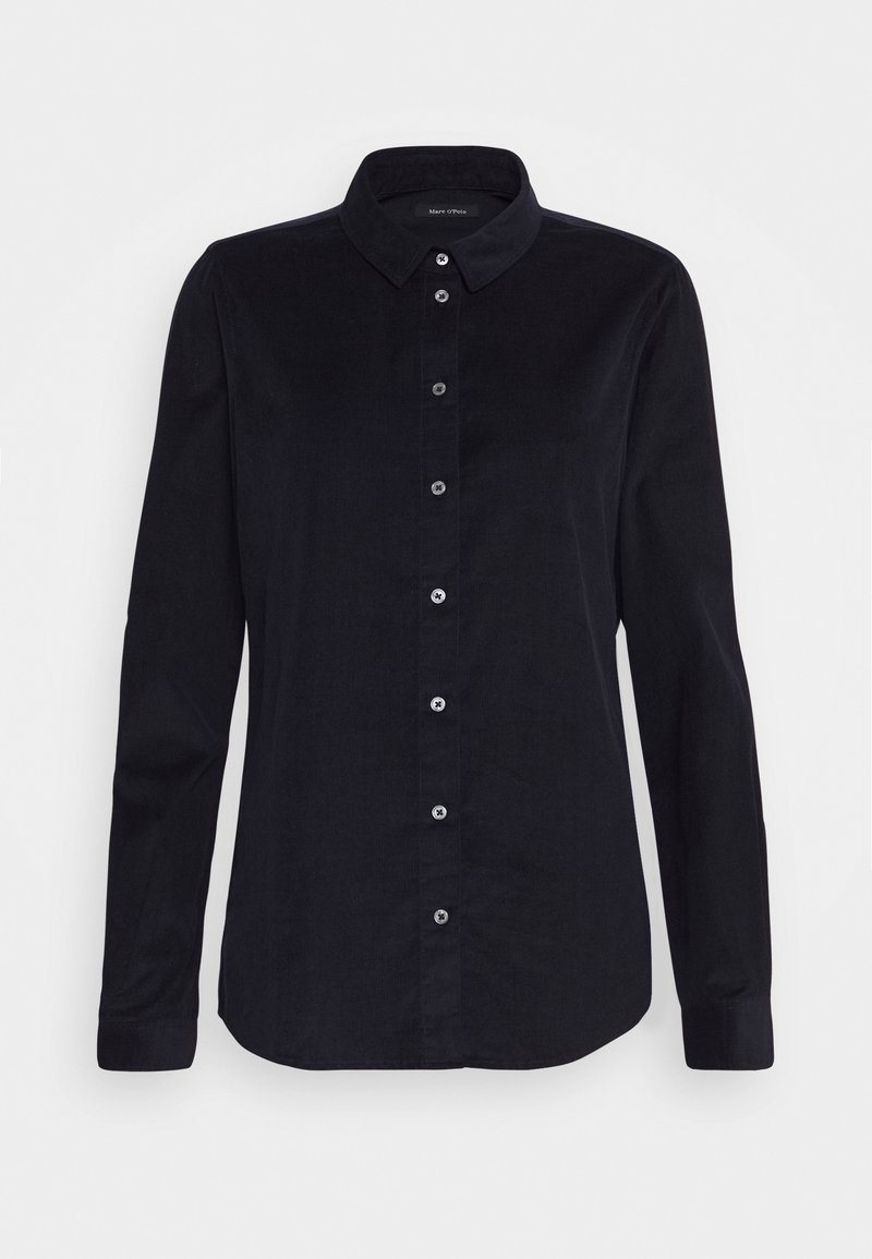Chemise noire à manches longues avec col et poignets boutonnés, présentée sur fond blanc.