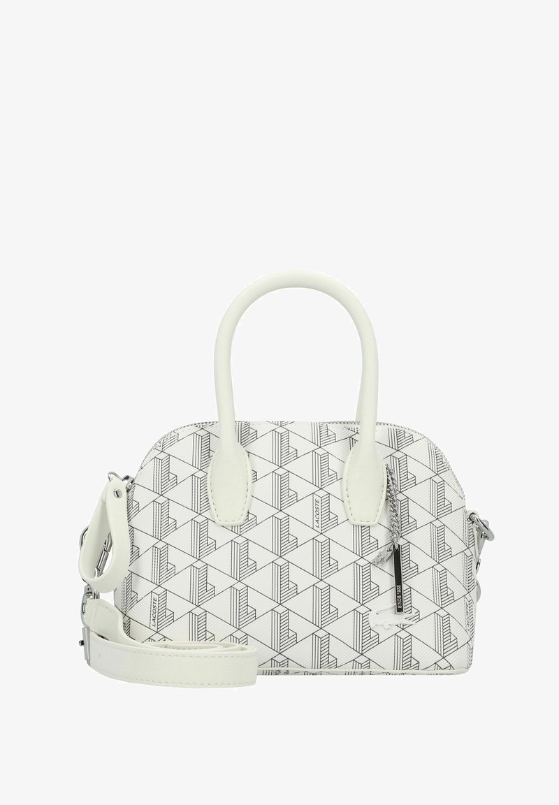 Sac à main blanc avec des motifs géométriques noirs, deux poignées supérieures, une bandoulière amovible et une poche zippée avec des détails de marque.