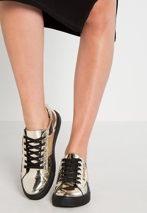 Tenisky - gold-coloured