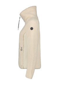 Veste en polaire couleur crème avec col montant, poche latérale zippée et patch rond noir avec logo sur le haut de la manche, vue de profil.