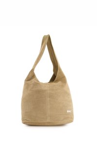 Beige ruskind skuldertaske med en rund form, bred rem og en quiltet sømdetalje. Minimalistisk design med et lille logoskilt.