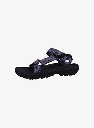 Black sporty sandal featuring purple and blue patterned straps, cushioned footbed, and a textured rubber sole for traction.