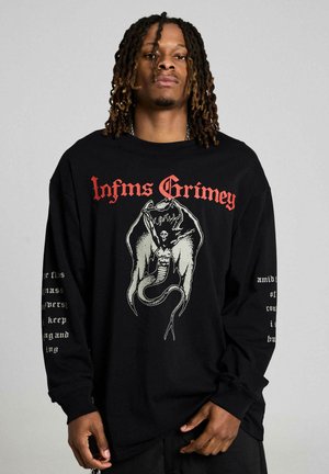 - Bluzka z długim rękawem