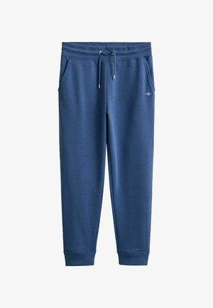 Blaue Jogginghose mit elastischem Bund, Kordelzug, Seitentaschen, gerippten Bündchen und kleinem, auf der rechten Vorderseite gesticktem Logo.