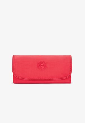 Red nylon wallet with a fold-over flap, featuring a circular logo on the front. Smooth texture, compact rectangular shape.