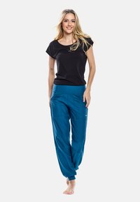 Winshape - FUNCTIONAL COMFORT TIME - Pantaloni de trening - teal green Imagine miniatură 1