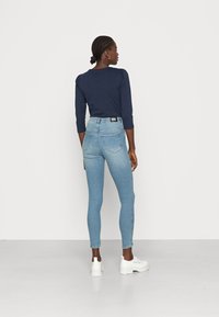 Dr.Denim MOXY - Calças de ganga de corte skinny - breeze mid blue