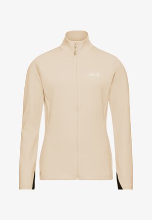 Veste de sport beige avec un col montant, une fermeture éclair intégrale, des manches longues et des accents noirs aux poignets, arborant un logo discret sur la poitrine.