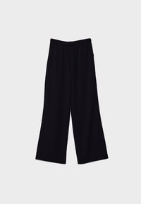 Pantalon noir à jambes larges avec taille élastique et cordon de serrage, présenté à plat sur un fond gris clair.
