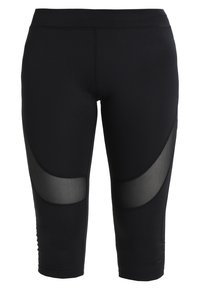 Mustat polvipituiset urheilulegginsit, joissa on kaarevat verkkopaneelit etureiden kohdalla hengittävyyden ja mukavuuden lisäämiseksi.