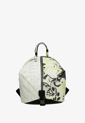 Sac à dos rond en tissu avec un design jaune clair et gris orné de motifs floraux. Comprend une fermeture éclair et des bretelles noires réglables.