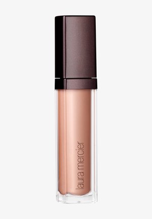 Lipgloss in een doorzichtige tube met een bronzen tint, met een vierkante donkerbruine dop en een gladde textuur. Het label zegt "Laura Mercier."