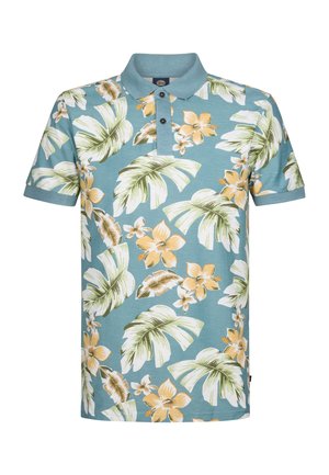 Short-sleeve polo shirt in light blue, featuring tropical flower and leaf patterns in green and yellow. Soft cotton material with collar.