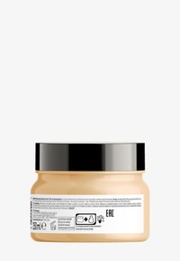 Beige jar with a black glossy lid, containing 250ml of product. Label includes detailed ingredients and disposal instructions on a white background.