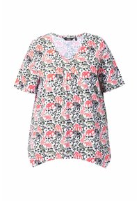 Kurzärmlige Bluse mit V-Ausschnitt, die ein buntes Tiermuster mit Elefanten und Blattwerk auf weißem Hintergrund zeigt. Lockerer Schnitt.