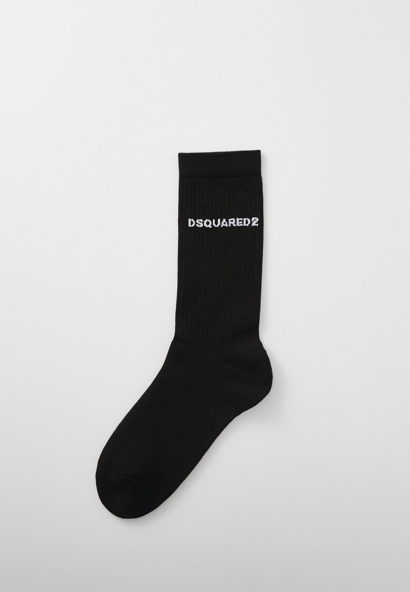 Melnas kokvilnas zeķes ar ribotu tekstūru un balto "DSQUARED2" logotipu izdrukātu sānos. Gluda apdare, standarta zeķes forma.