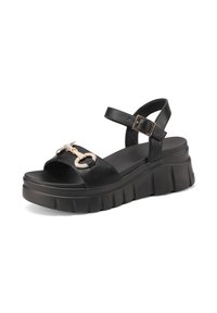 Sandali platform neri con tomaia in pelle liscia, cinturino alla caviglia regolabile e una decorativa catena metallica sulla parte anteriore.