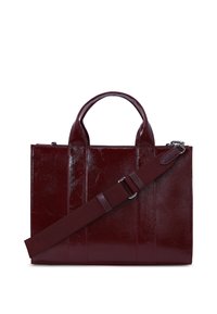 Burgundy leather tote bag with shiny finish, two top handles, and detachable strap. Features vertical panel detailing and silver hardware accents.
