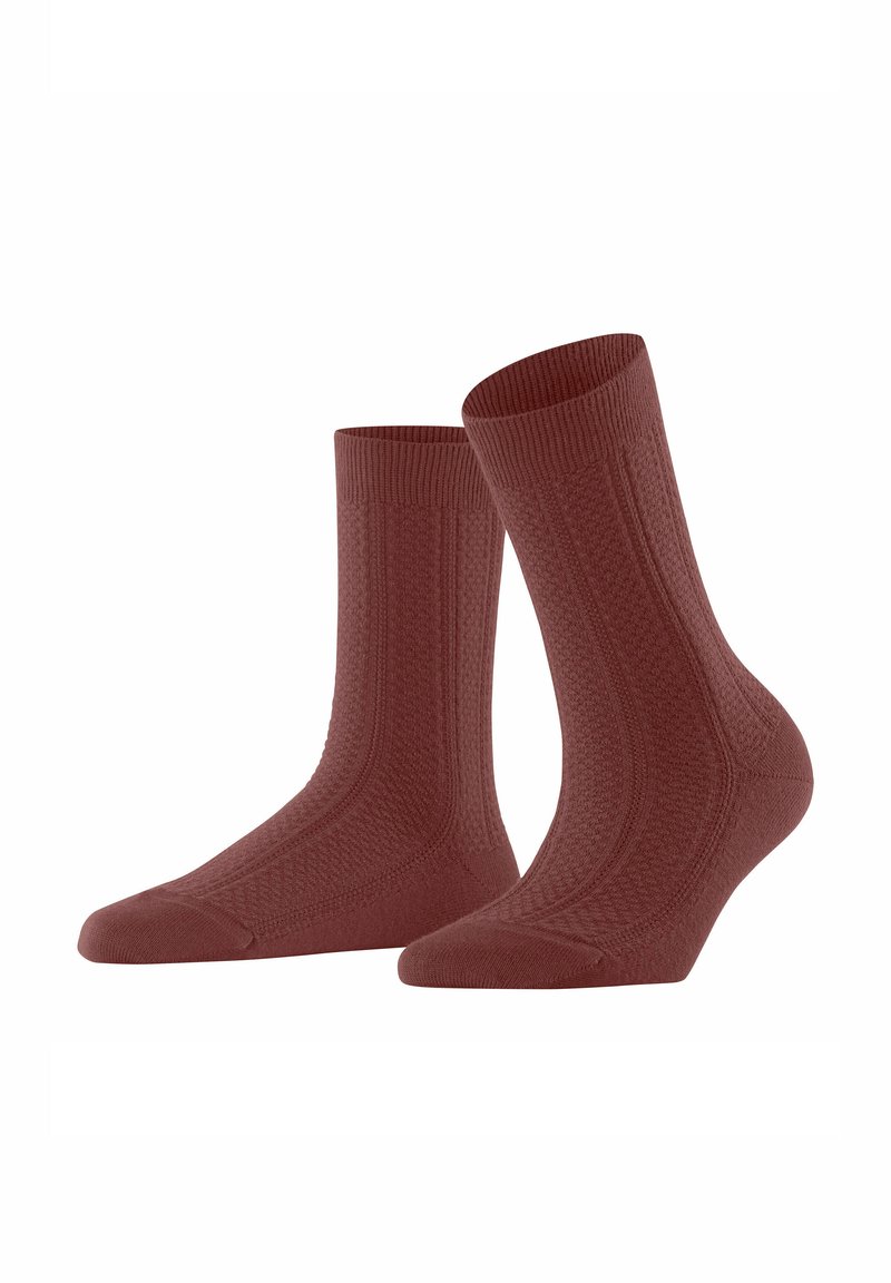 Rote strukturierten Socken mit geripptem Bündchen, die ein diamantartiges Muster aufweisen und verstärkte Zehen und Fersen für Langlebigkeit bieten. Material aus Baumwollmischung.