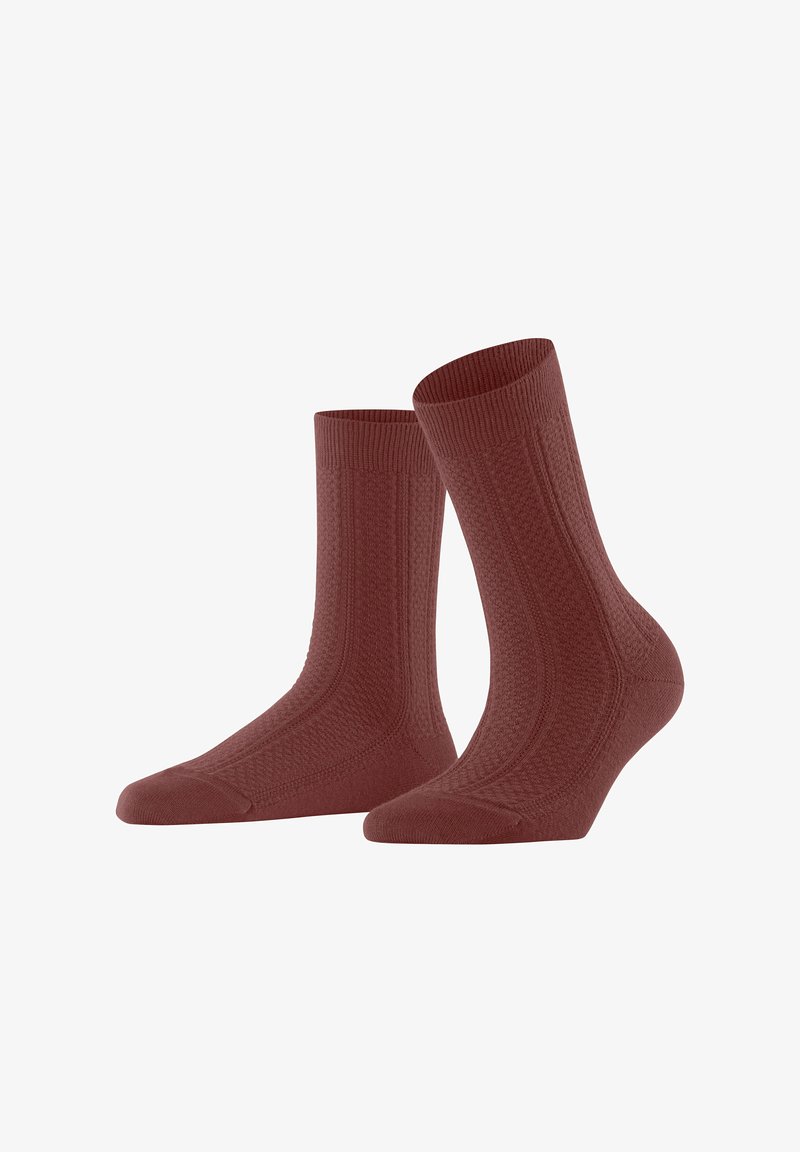 Rote strukturierten Socken mit geripptem Bündchen, die ein diamantartiges Muster aufweisen und verstärkte Zehen und Fersen für Langlebigkeit bieten. Material aus Baumwollmischung.