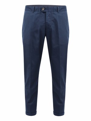 Navy blue chinos made from cotton, featuring a button closure, belt loops, a smooth texture, and rolled cuffs at the hem.
