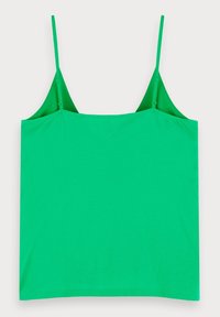 Vihreä toppi, jossa on ohuet säädettävät hihnat, valmistettu sileästä kankaasta, ja jossa on neliömäinen leikkaus sekä minimalistinen muotoilu.