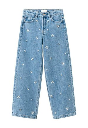 Jeans a gamba larga azzurri con piccoli ricami di margherite bianche sparsi su tutto il tessuto.
