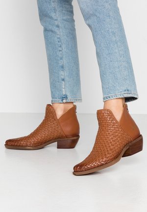 Enkelkaarsjes - cognac