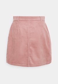 Růžová manšestrová minisukně s vertikálními žebry, vysokým pasem a čistě střiženým lemem. M�á přední švy a texturovaný povrch.