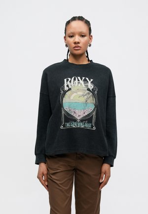 - Bluzka z długim rękawem