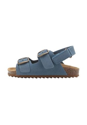 Sandale en daim bleu avec deux brides réglables à boucle et une bride arrière, dotée d'une semelle intérieure en liège et une semelle extérieure marron rainurée.