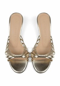 Metallic gold slide sandals featuring a square toe, multiple intertwined straps, and a smooth matte insole. No visible hardware accents.