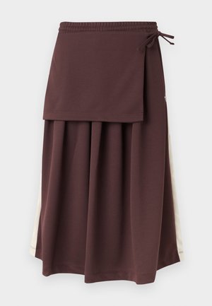 Brown midi skirt with pleats and an attached wrap panel tied at the waist, featuring white vertical side stripes.